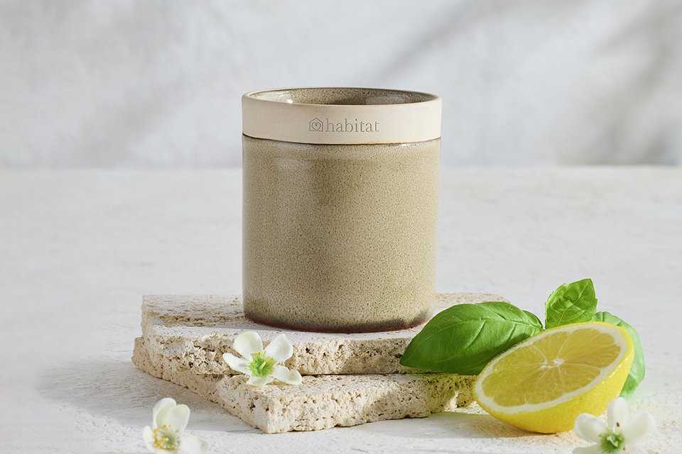 A Habitat small ceramic Geranium and Basil candle.