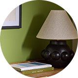 A black Habitat single mount multi photo picture frame on a wall.