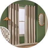 Grey Habitat blackout Jacquard eyelet curtains in a living room.