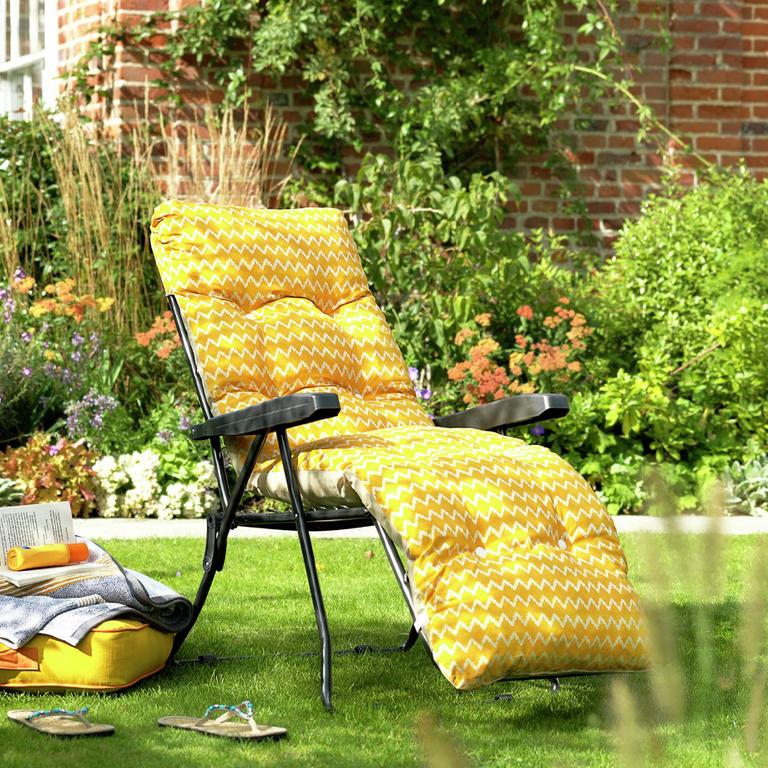 Yellow folding sun lounger.