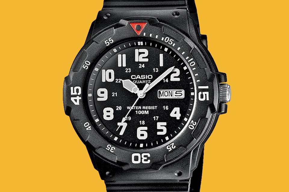 A Casio black resin strap men's watch with round dial.