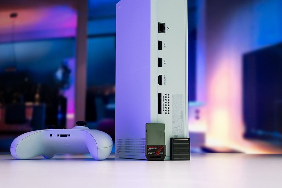 SANDISK Xbox gaming storage expansion displayed beside a gaming console.