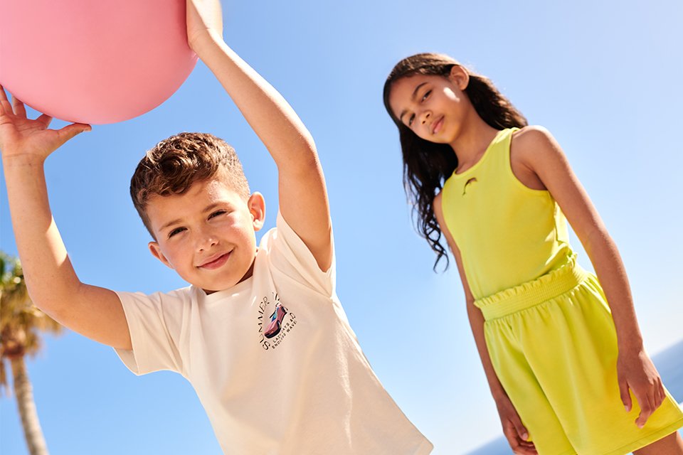 boy and girl in summer clothing.
