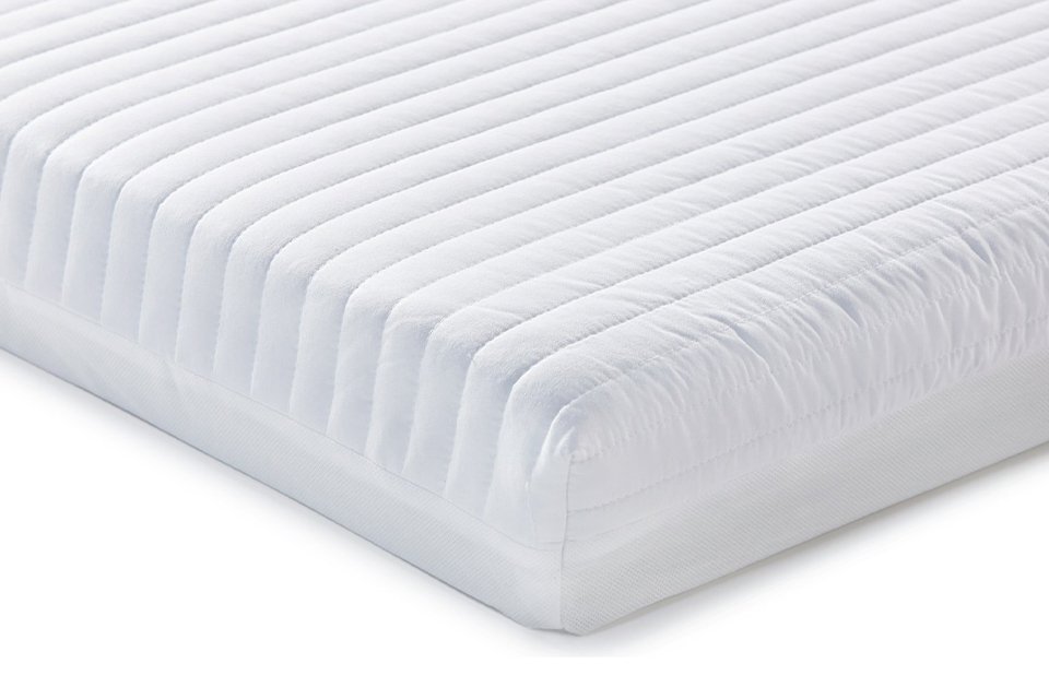A Baby Elegance microfibre cot bed mattress.