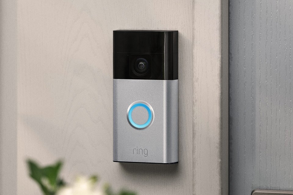 A Ring video doorbell placed outside at doorstep of the house.