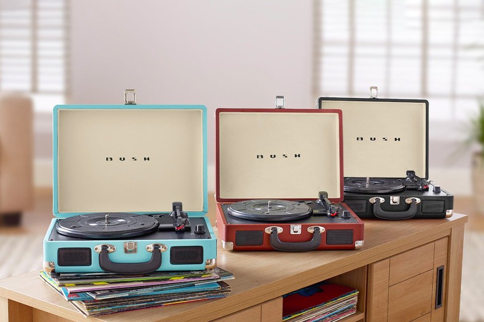 Three Bush classic retro portable case record players.