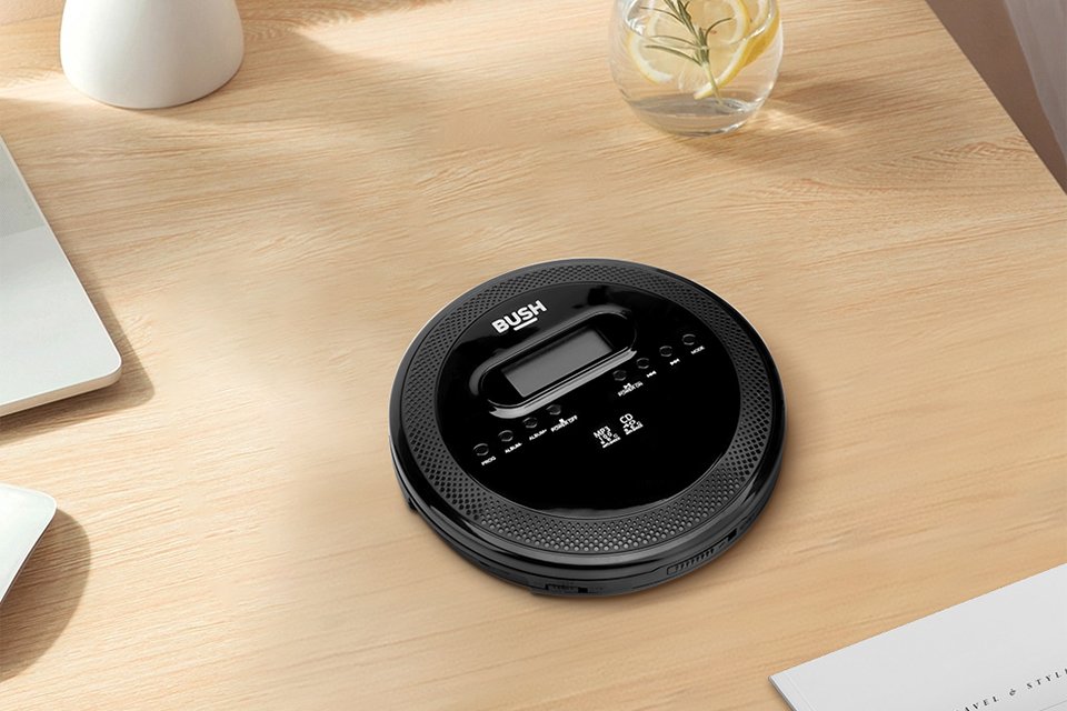 Bush CD player with MP3 playback on a wooden table.