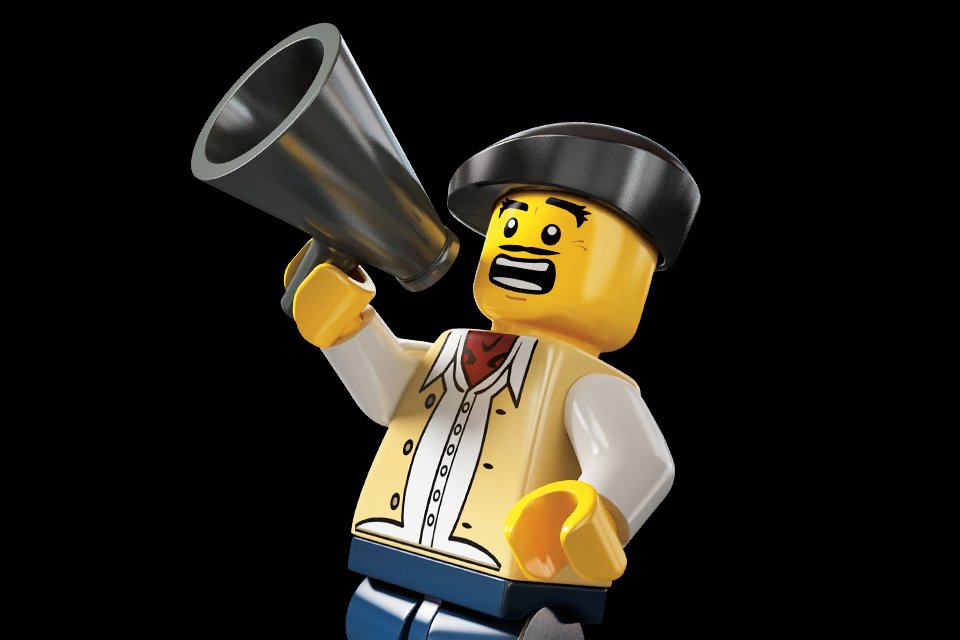 LEGO® minifigure shouting into a megaphone on a black background. 