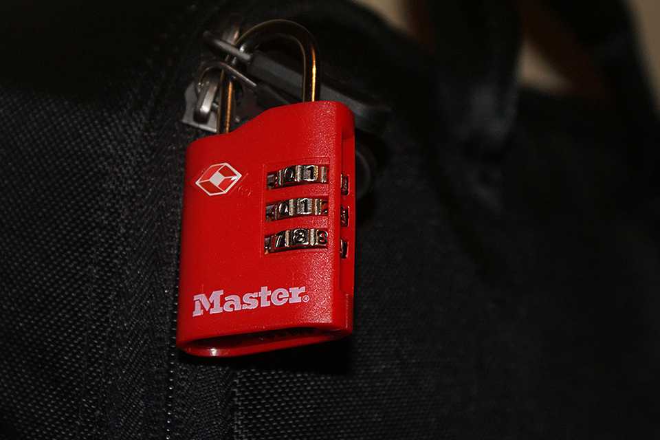 Master Lock TSA 3 Digit Combi travel padlocks in red. 