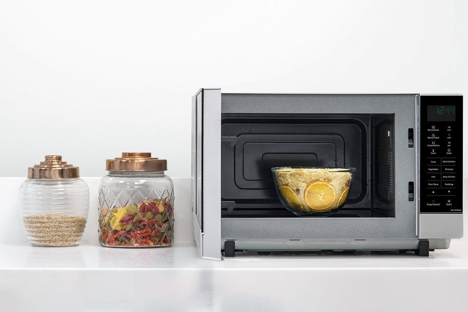 Panasonic 1000W Standard Flatbed Microwave NN-SF464M in silver finish.