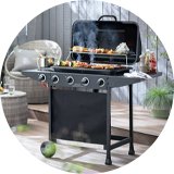 BBQ in garden with food cooking.