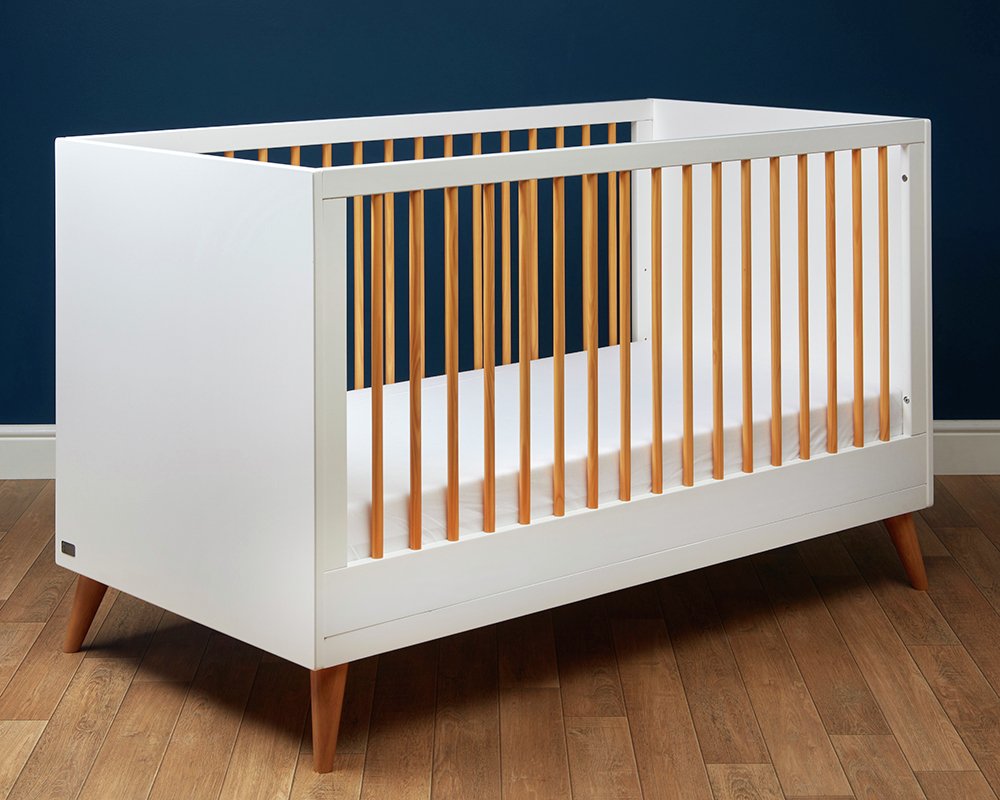 white and wood cot bed