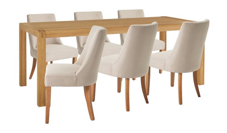 Solid oak dining table and chairs for discount sale