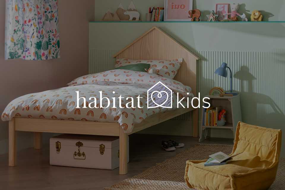 Kids wooden bed with rainbow bedding and colourful room.
