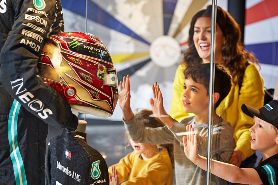Family enjoying an interactive museum exhibit.