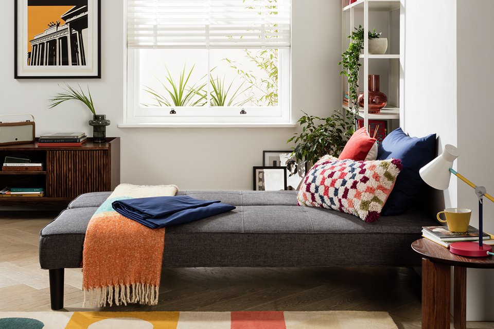 2 seater sofa bed in living room seating.