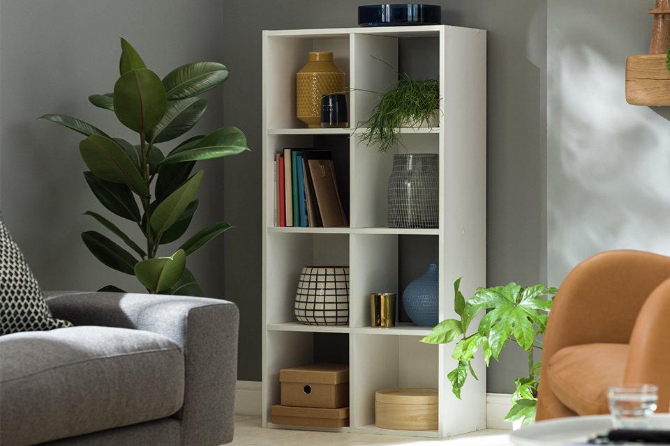 White cube storage unit.