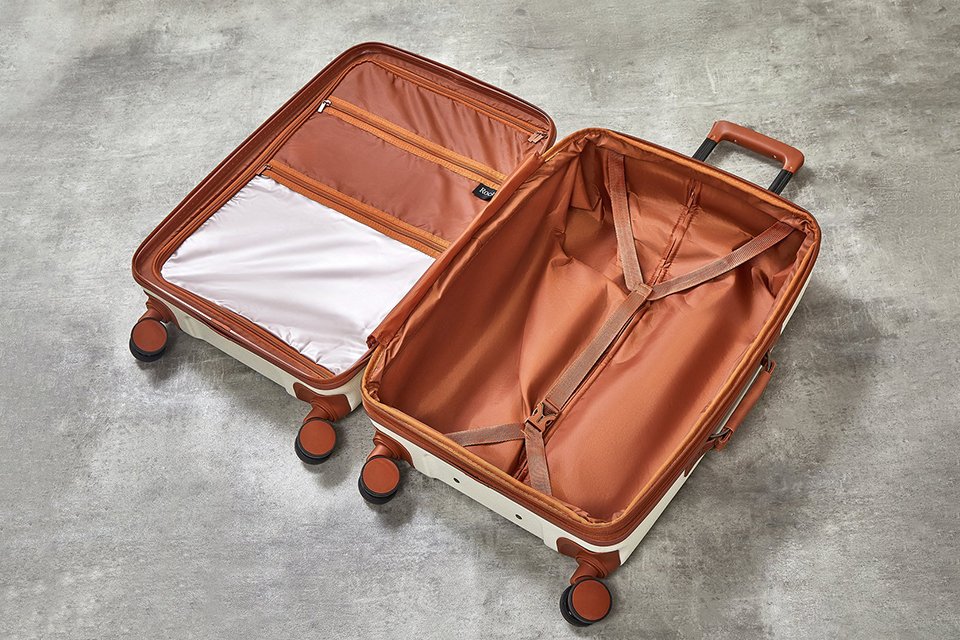 Holiday travel essentials. Includes suitcases, towels, sun accessories and more.