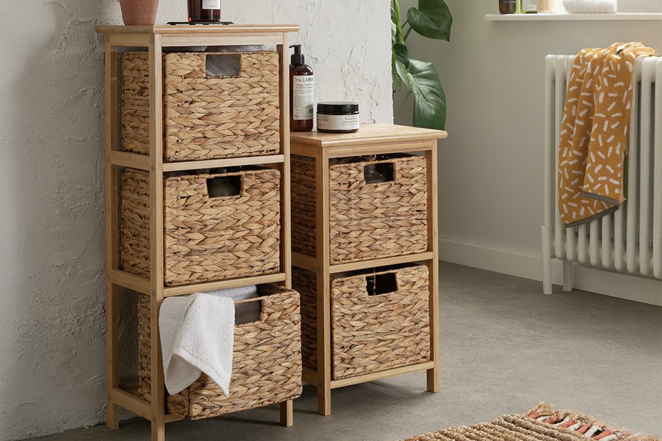 2 cube storage units in a bathroom.