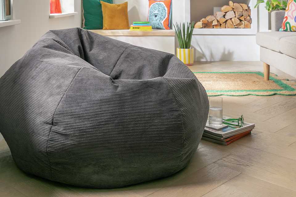 Beanbag in living room for a cosy reading corner with books.