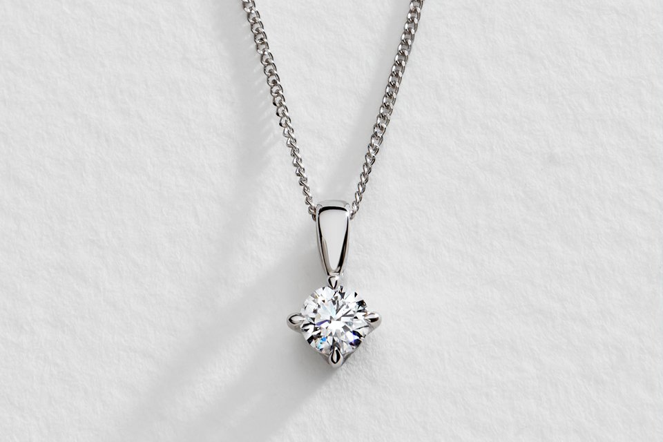 A Pure Brilliance diamond pendant necklace.