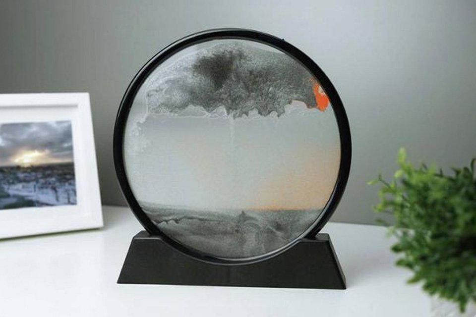 A Menkind InGenious Sand Art Circular Sandscape.