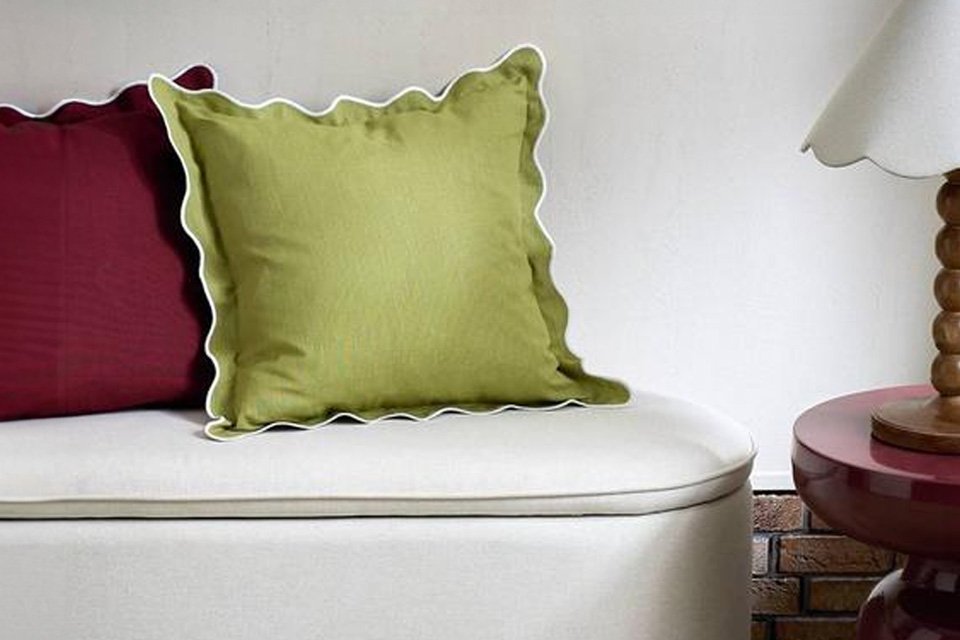 A Habitat scallop cushion in olive.