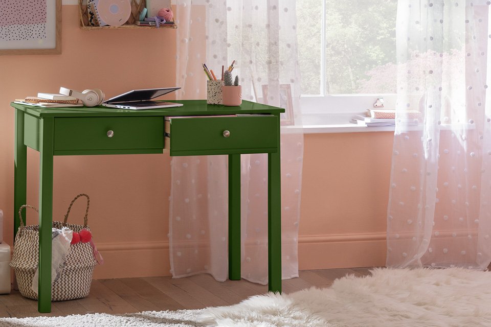 A Habitat Brooklyn kids' desk in green in a child's room.