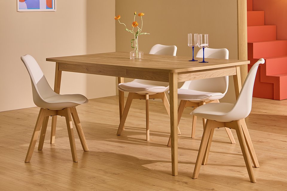 Habitat Sylas Solid Wood 4 Seater Dining Table in natural finish.
