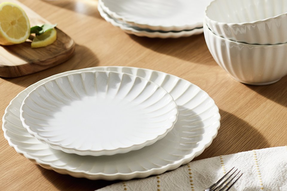 Argos Home Scalloped Edge 12 piece dinnerset in white colour on a wooden dining table.