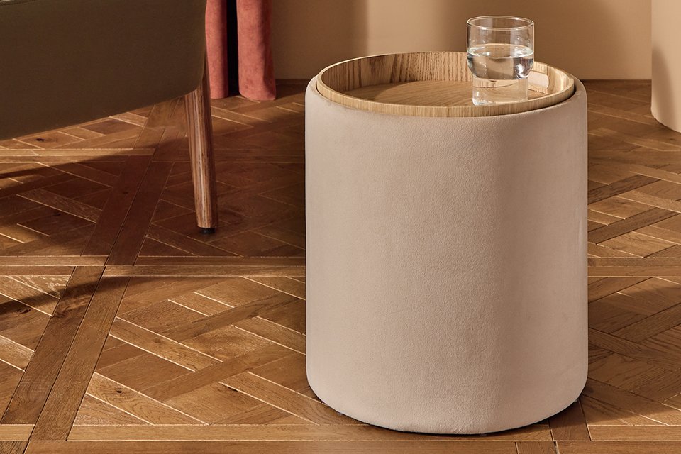 A glass on a Habitat Ingo Side Table - Natural.