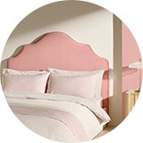 Habitat Daphne headboard in pink velvet.
