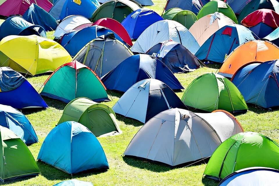 Tents in a field.