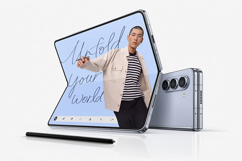 Two Samsung Galaxy Z Fold5 smartphones with an S pen.