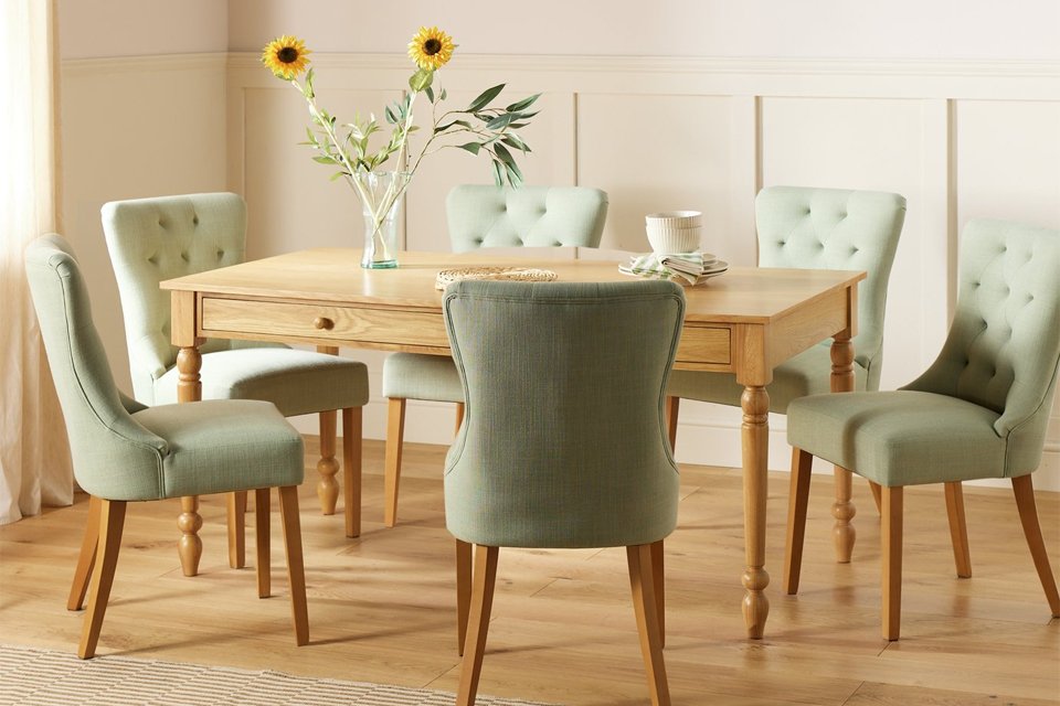 An Ah Bess table and 6 GRN Novara chairs.