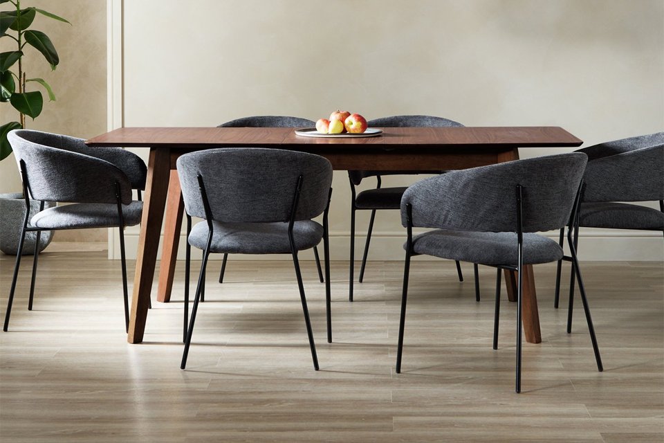 A Habitat Callan extending dining table and 6 charcoal chairs.
