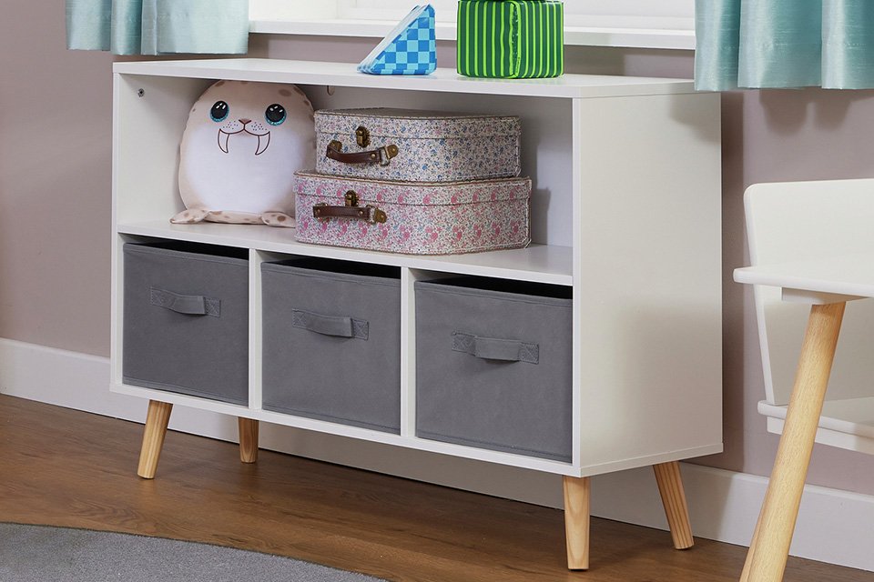 A white Liberty House Kids storage unit with storage bins.