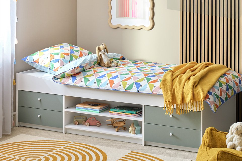 A Malibu Kids Cabin Bed in green and white. 