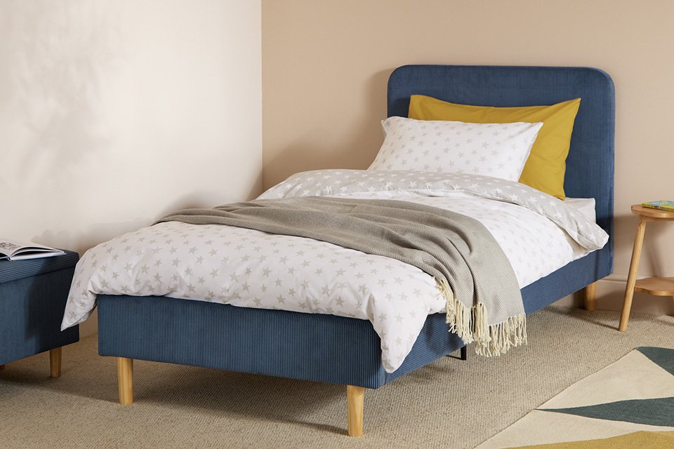 A Habitat Arden single cord upholstered bed in blue.