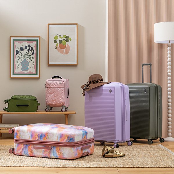 Holiday travel essentials. Suitcases, travel accessories, beach towels and holiday must-haves.