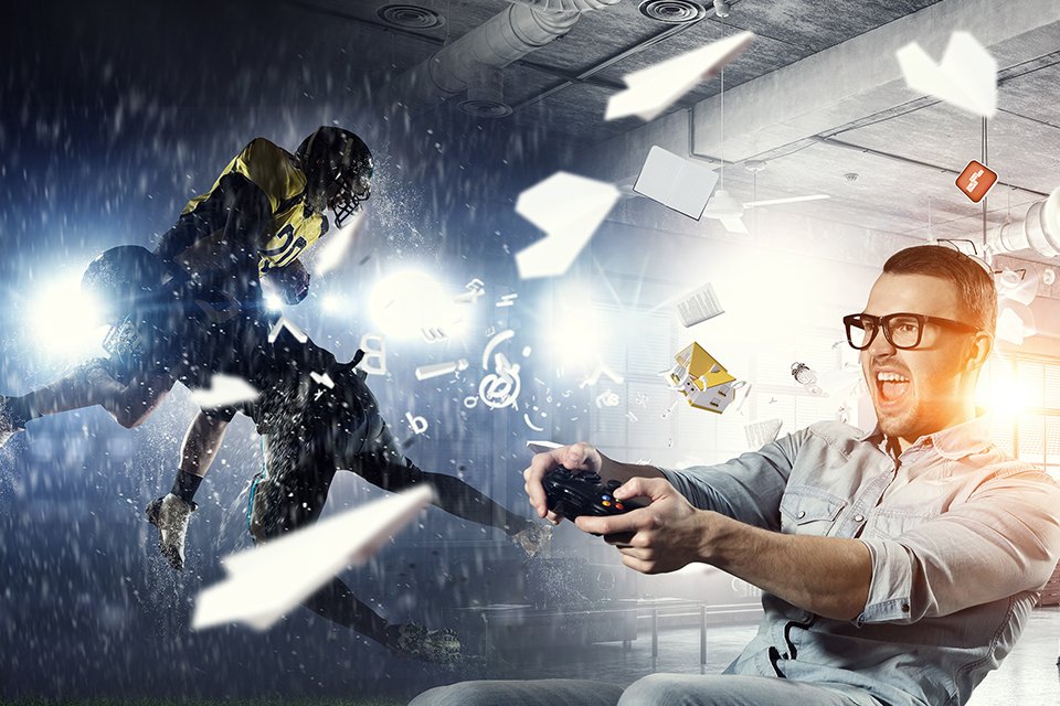 A man plays upcoming games with a controller.