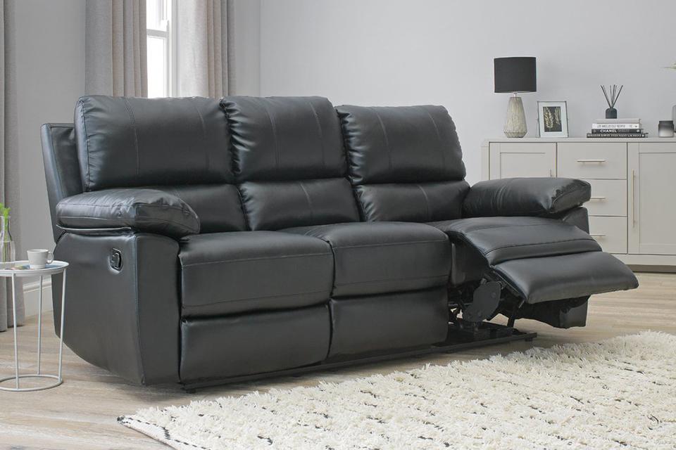 The black Argos Home Toby 3-seater faux leather recliner sofa in black.