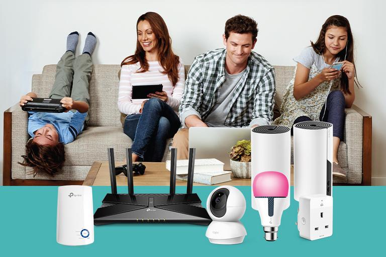 Image shows a family sitting on a sofa, all on different devices: phones, tablets, games, and a laptop. In the foreground are a variety of TP-Link Wi-Fi network products.