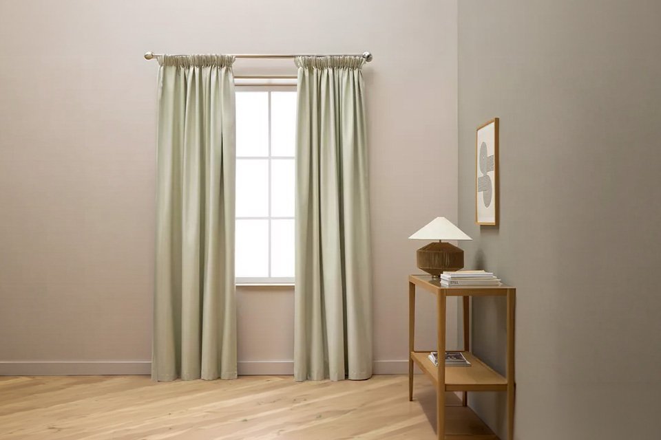 Habitat Blackout Pencil Pleat Curtains in cream colour.