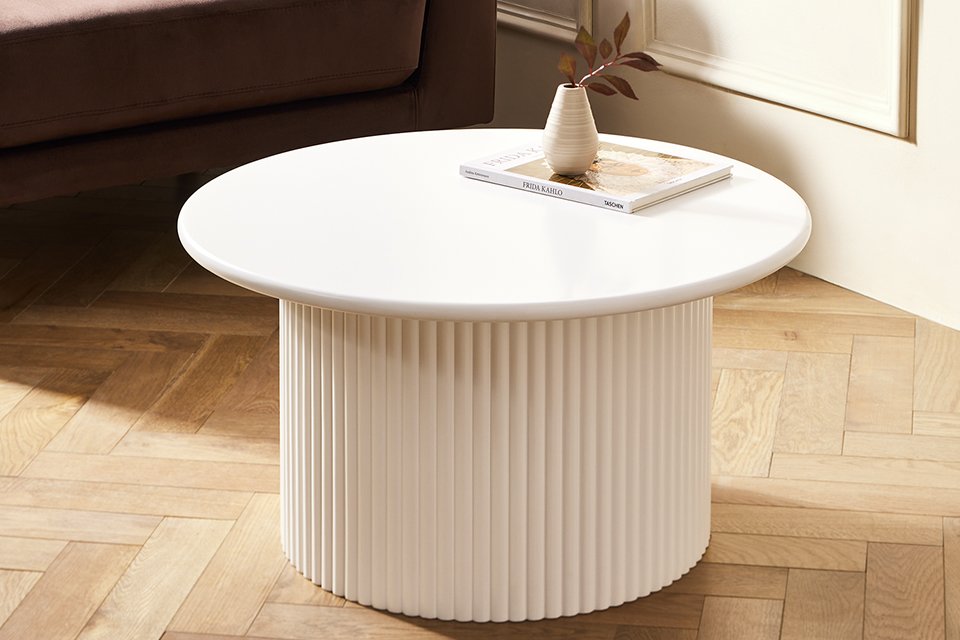 A Habitat Luan slatted round coffee table in white.