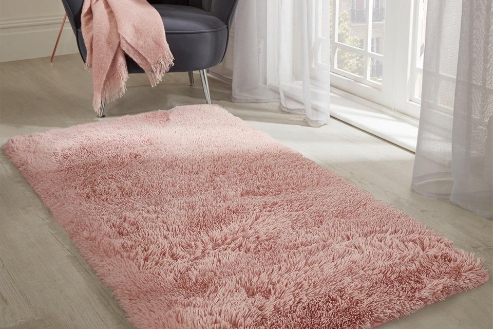 A blush OHS soft fluffy fleece rug runner in a living room.