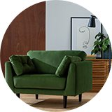 Fabric cuddle chair in forest green.