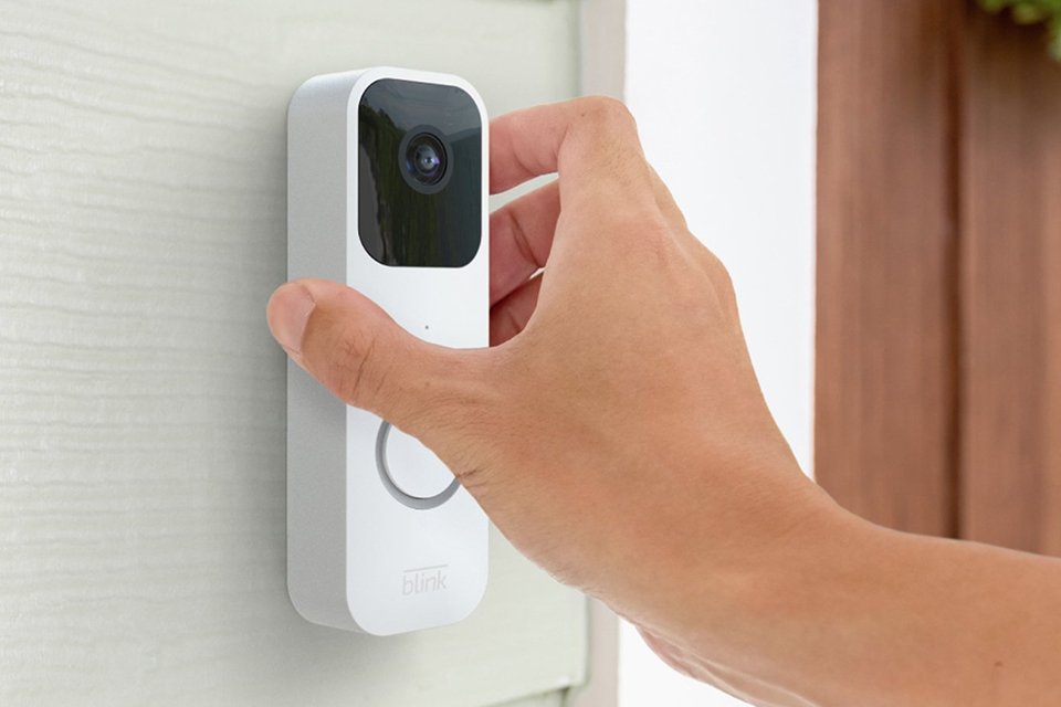 A Blink video doorbell wired or battery in white.
