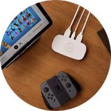 Elgato 4K60 HDR Game Capture Neo placed on a table.