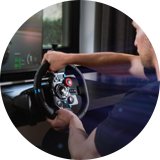 A man using Logitech G29 Driving Force Gaming Steering Wheel - PS, PC.